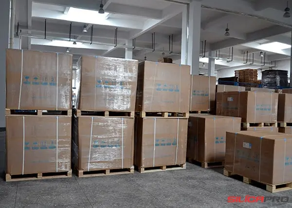 Shrink wrapped cartons of high silica products stacked on pallets for export